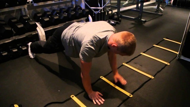 'Plank Exercise: Side Shuffle'