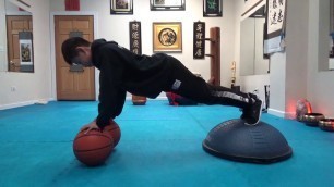 'Double Basketball Bosu Plank Fitness Challenge'