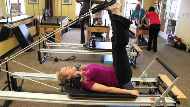 'Melanie Rogers Pilates Instructor at Fitness Quest 10 demonstrates the Long Spine.mov'