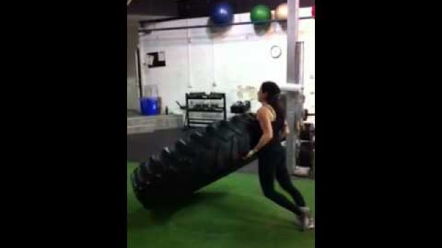 'Macho femme fitness lifting another tire!'