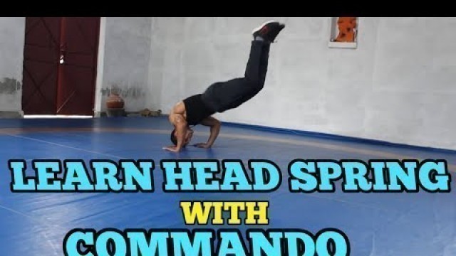 'FORWARD ROLL HEAD SPRING WITH COMMANDO'